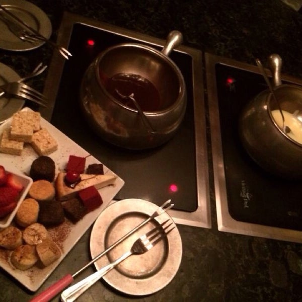Photo taken at The Melting Pot by Alaa on 1/25/2014