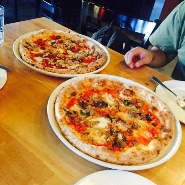 Photo taken at Tutta Bella Neapolitan Pizzeria by Charisse J. on 6/23/2015