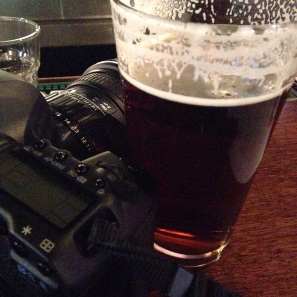 Photo taken at Dillinger&#39;s Taproom by Alex C. on 2/11/2014