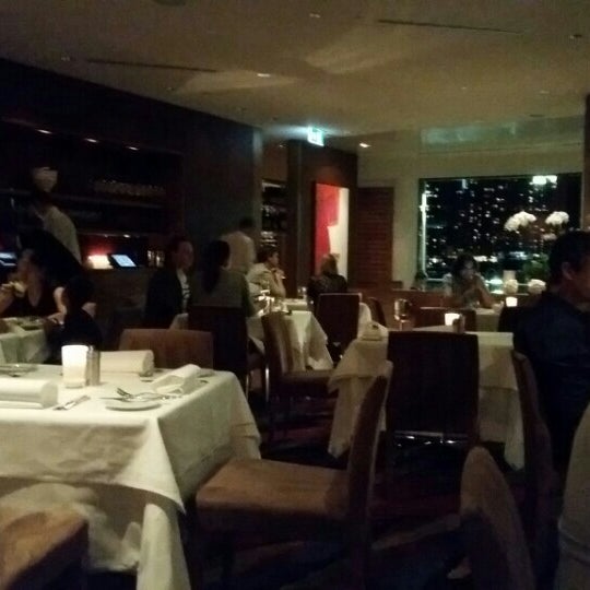 Photo taken at Aria Restaurant by Molly C. on 4/25/2015