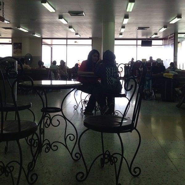 Photo taken at Philip S.W. Goldson International Airport (BZE) by Billy U. on 5/19/2013