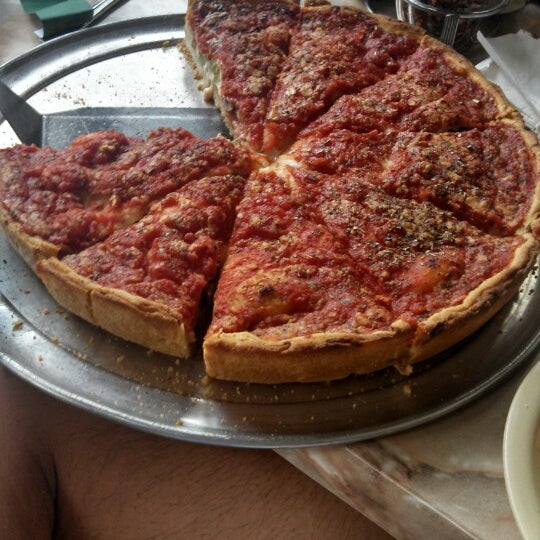 Photo taken at Gullivers Pizza and Pub Chicago by Wayland H. on 8/11/2013