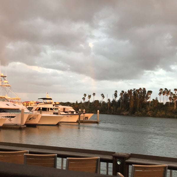 Photo taken at Outriggers Tiki Bar and Grille by Justin N. on 3/8/2020