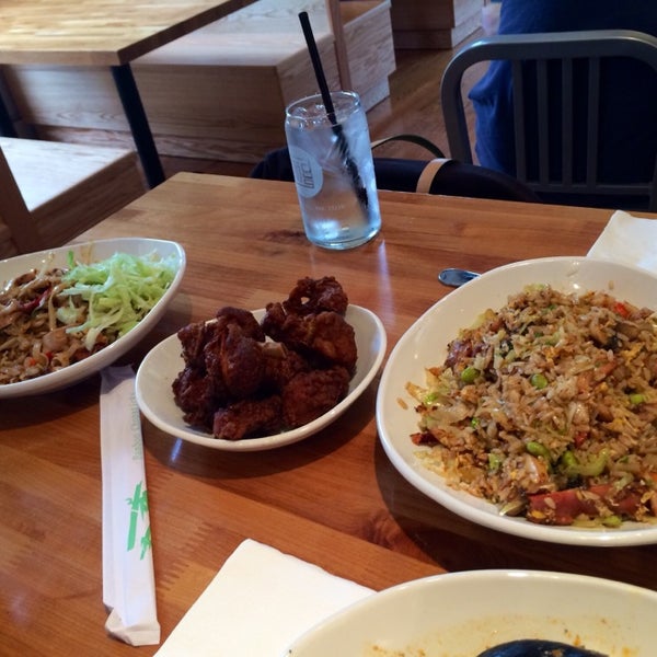 Photo taken at Foo Dog: Asian Street Food by Eileen B. on 4/19/2014