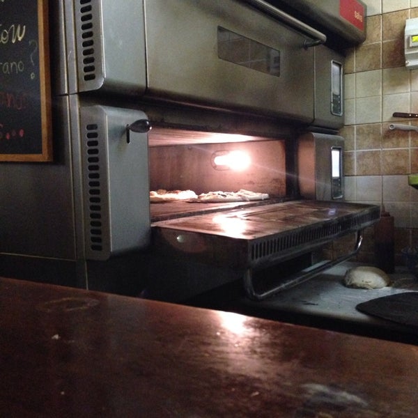 Photo taken at Pizza Pazza by Sara P. on 2/15/2014
