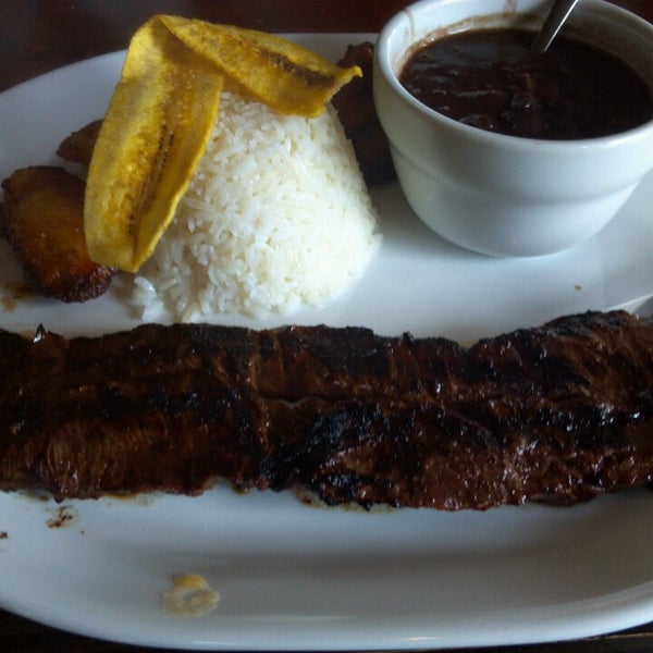 Photo taken at Paladar Cuban Restaurant &amp; Rum Bar by Roberto M. on 6/16/2013