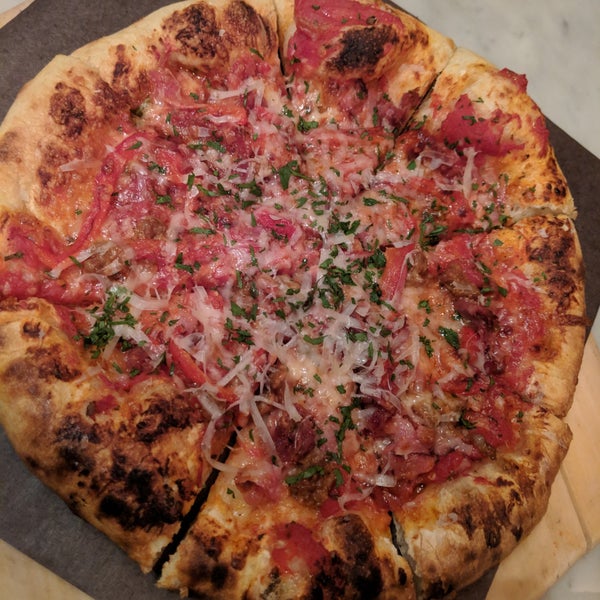 Photo taken at Posto Pizzeria and Bar by anna e. on 2/25/2019