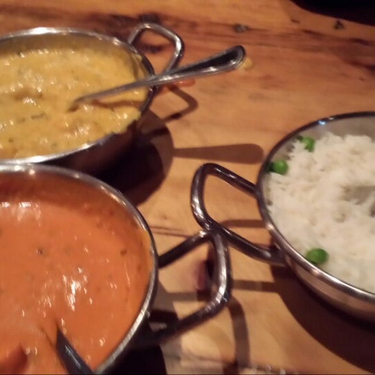 Photo taken at Brick Lane Curry House by Tom O. on 10/10/2013