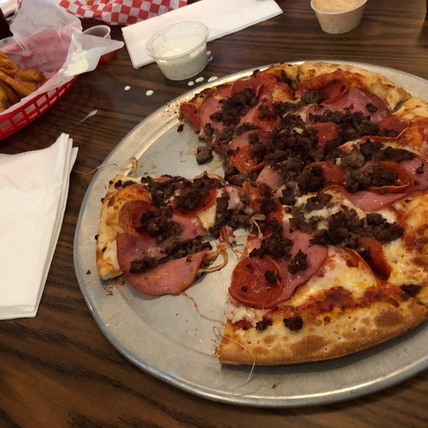 Photo taken at Spooky&#39;s Pizza by Naz on 7/29/2019