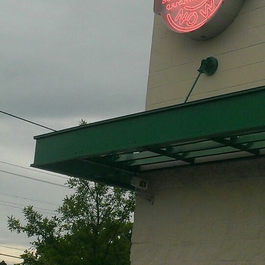 Photo taken at Krispy Kreme Doughnuts by Ashlee B. on 5/26/2013