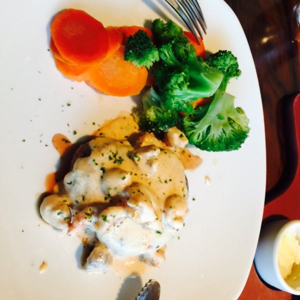 Photo taken at Outback Steakhouse by Alaine E. on 3/10/2015