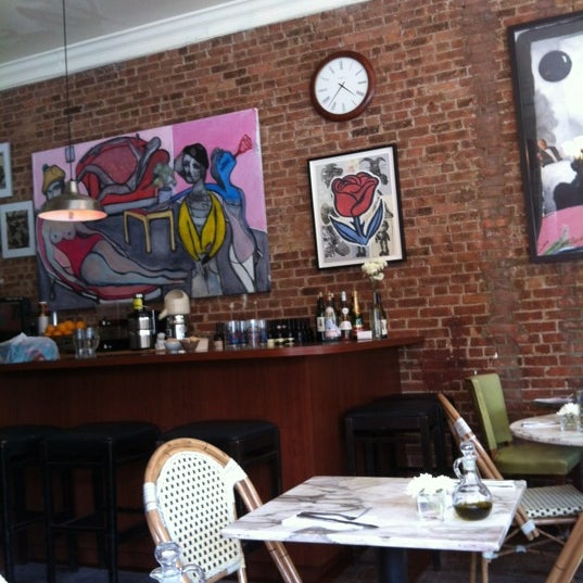 Photo taken at Rafaella Cafe by Daniela B. on 8/9/2012