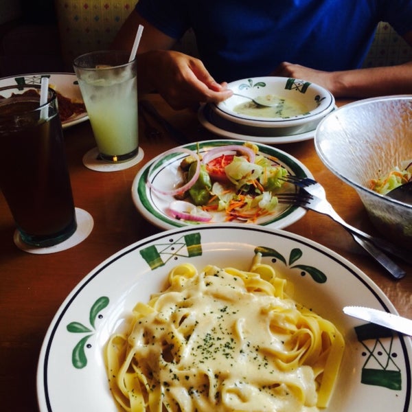Photo taken at Olive Italian Restaurant by Karina P. on 2/11/2015