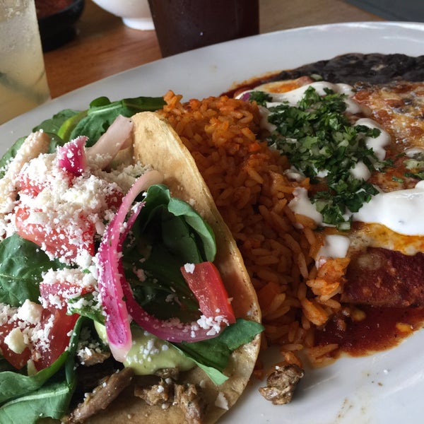 Photo taken at Fat Fish Cantina Grill by Cheearra E. on 5/11/2015