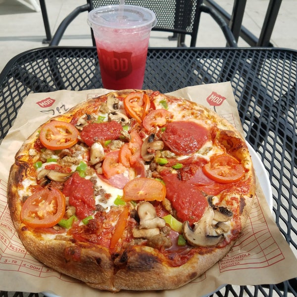 Photo taken at Mod Pizza by Dez L. on 4/6/2018