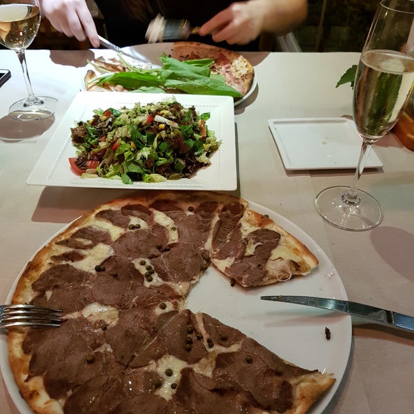 Photo taken at Beppe Pizzeria by Özge Hilal on 2/24/2018