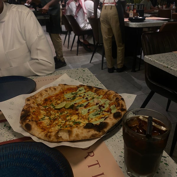 Photo taken at 8portions Pizza by Mohammed . on 5/14/2024