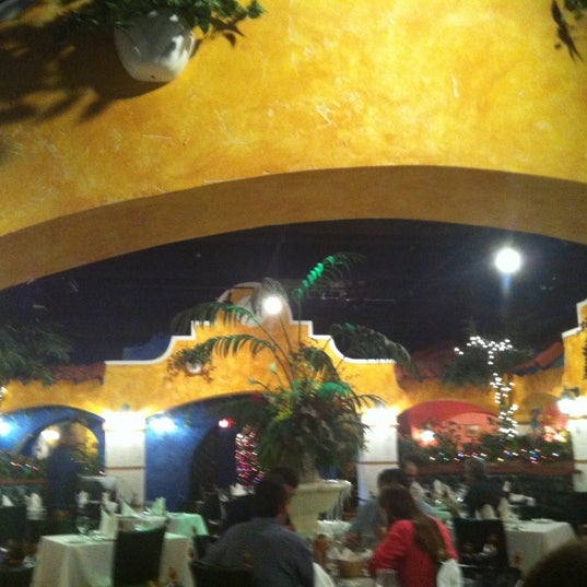 Photo taken at El Novillo Restaurant by Omar A. on 12/12/2012