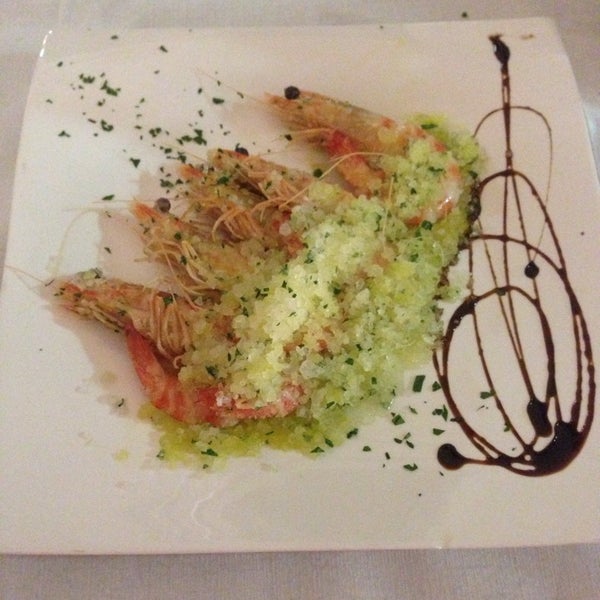 Photo taken at Al Porto ristorante cruderia by Yana L. on 8/27/2014
