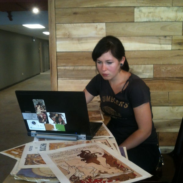 Nikki researching design ideas for our opening announcements.