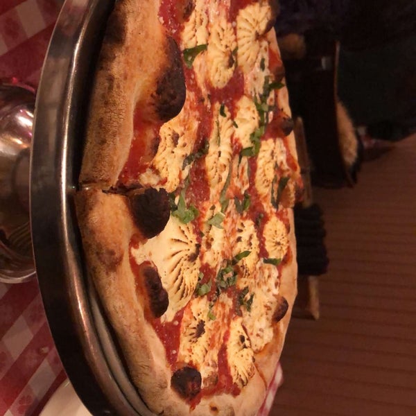 Photo taken at Lombardi&#39;s Coal Oven Pizza by Fatima on 2/15/2020