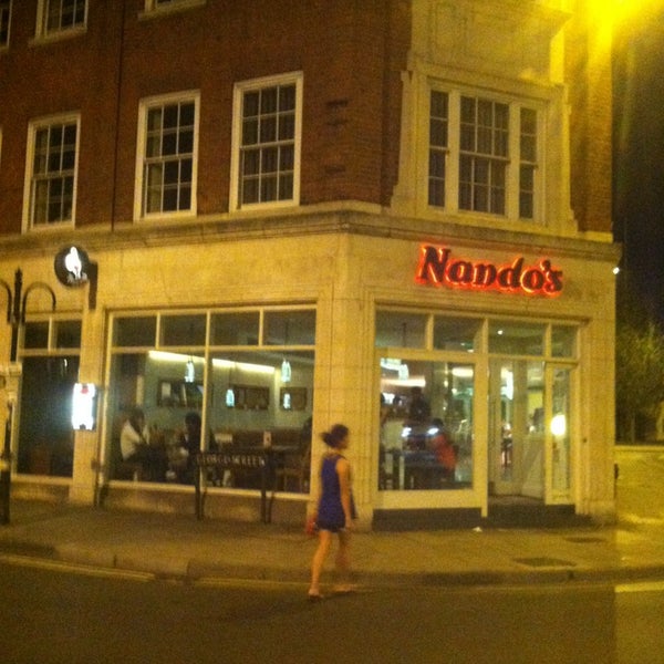 Photo taken at Nando&#39;s by Brian S. on 7/7/2013