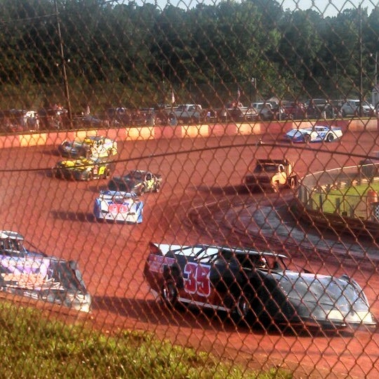 Photo taken at Dixie Speedway Home of the Champions by Garrett S. on 6/22/2013