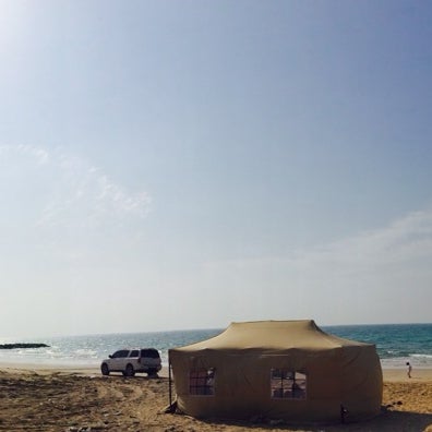 Photo taken at Al Rams Beach by Abdulla on 1/31/2014