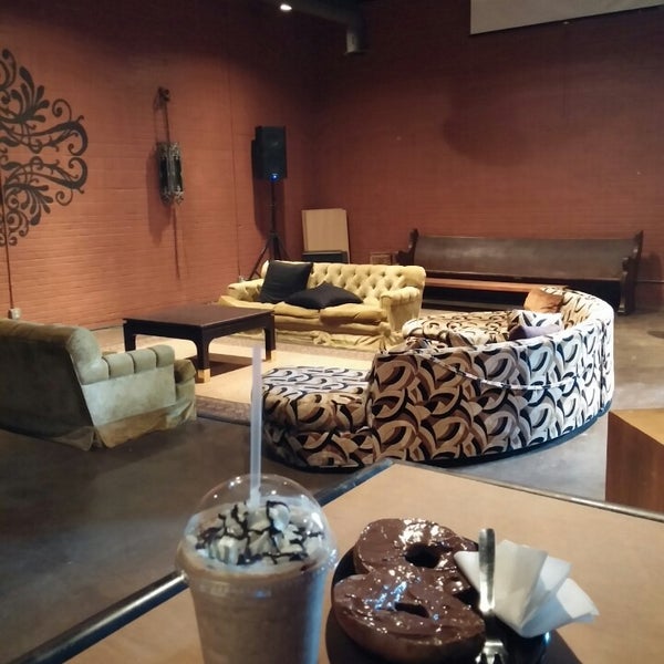 Photo taken at Mokah Coffee &amp; Tea by Jonathan K. on 1/22/2014