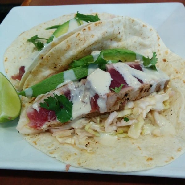 Fish tacos are a good thing to try!