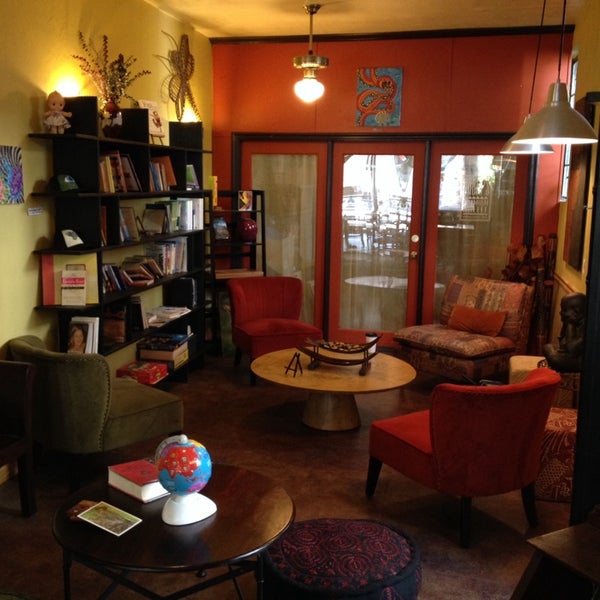 Photo taken at 100th Monkey Cafe &amp; Books by Chris W. on 9/30/2013