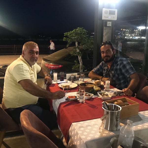 Photo taken at Mavi Balık&amp;Meze Restaurant by Kaan T. on 7/16/2020