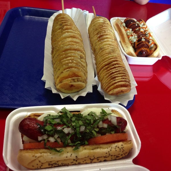 Photo taken at Greatest American Hot Dogs by Sarah P. on 8/16/2013