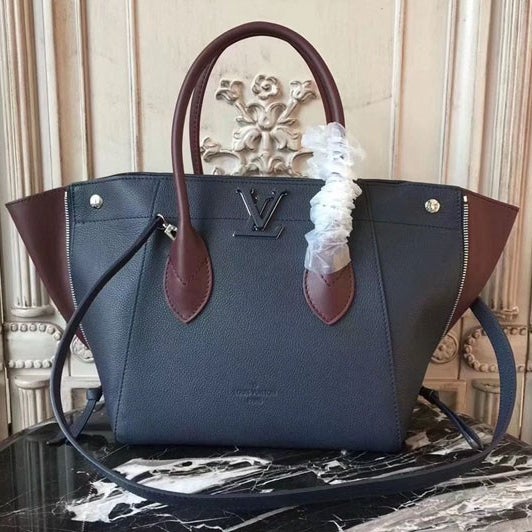 Louis Vuitton Freedom Handbag Calfskin at 1stDibs