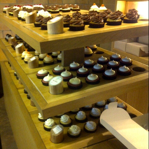Photo taken at Buttercupp - A Cupcake Shoppe by Kim on 9/18/2012