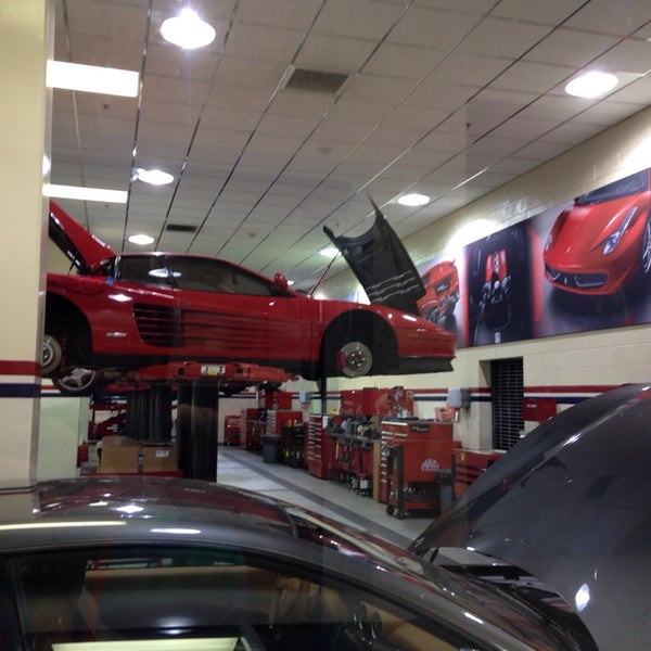Photo taken at Ferrari Maserati Showroom and Dealership by Sebastian B. on 12/15/2013
