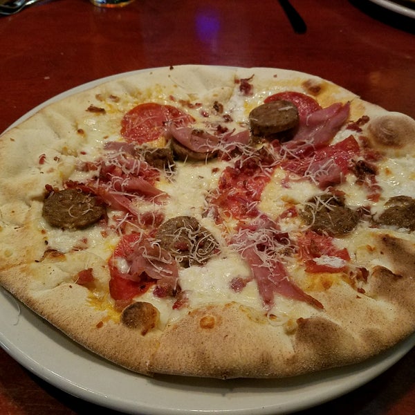 Photo taken at Brixx Wood Fired Pizza by Gadget G. on 10/14/2016