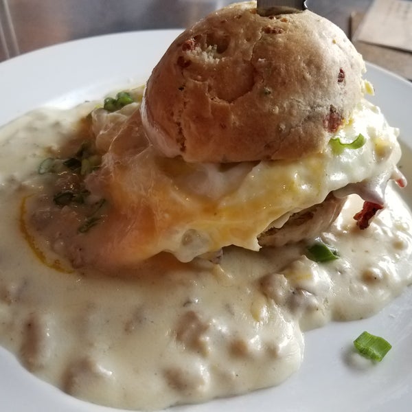 Breakfast sammie- bacon, sausage, and egg on an amazing biscuit, surrounded in the best gravy ever