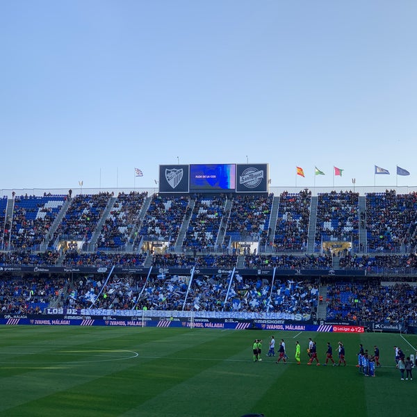 Photo taken at La Rosaleda Stadium by Rocio Q. on 2/24/2019