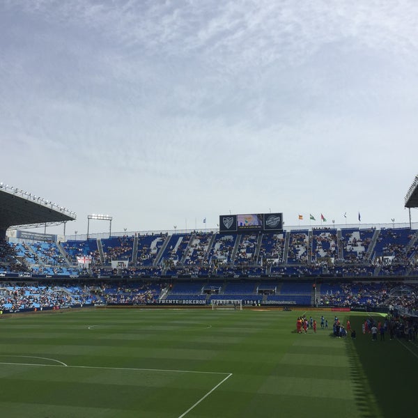 Photo taken at La Rosaleda Stadium by Rocio Q. on 4/22/2018
