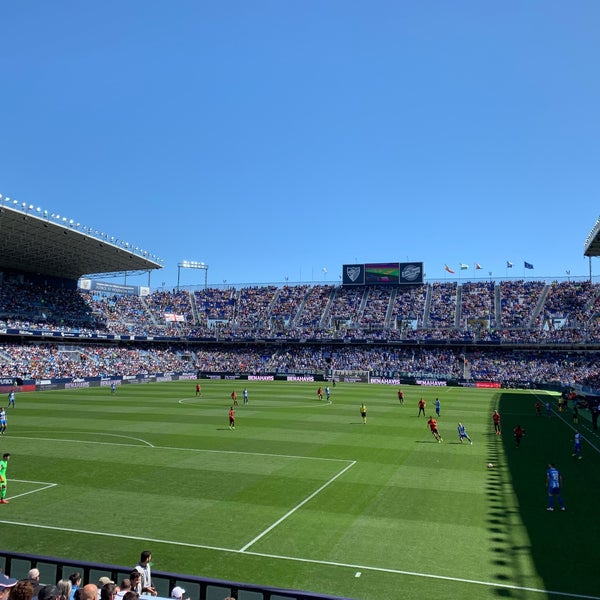 Photo taken at La Rosaleda Stadium by Rocio Q. on 4/27/2019