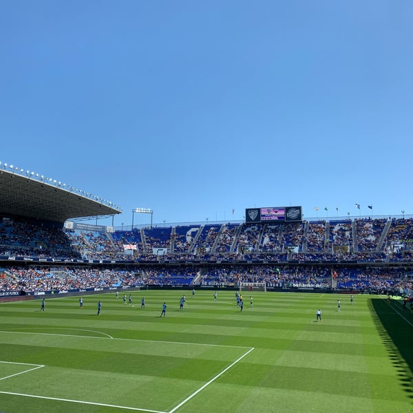 Photo taken at La Rosaleda Stadium by Rocio Q. on 4/13/2019