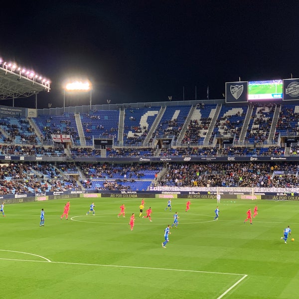 Photo taken at La Rosaleda Stadium by Rocio Q. on 1/19/2019