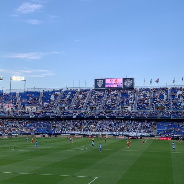 Photo taken at La Rosaleda Stadium by Rocio Q. on 5/24/2019
