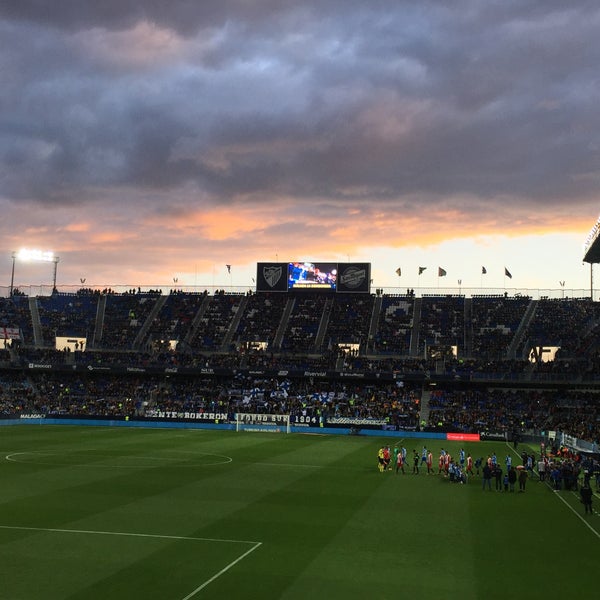 Photo taken at La Rosaleda Stadium by Rocio Q. on 1/27/2018