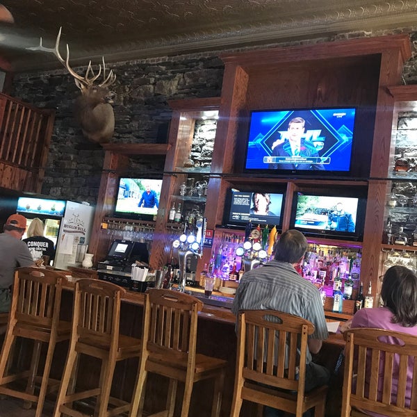 Photo taken at Buglin&#39; Bull Restaurant and Sports Bar by Robert S. on 8/6/2020