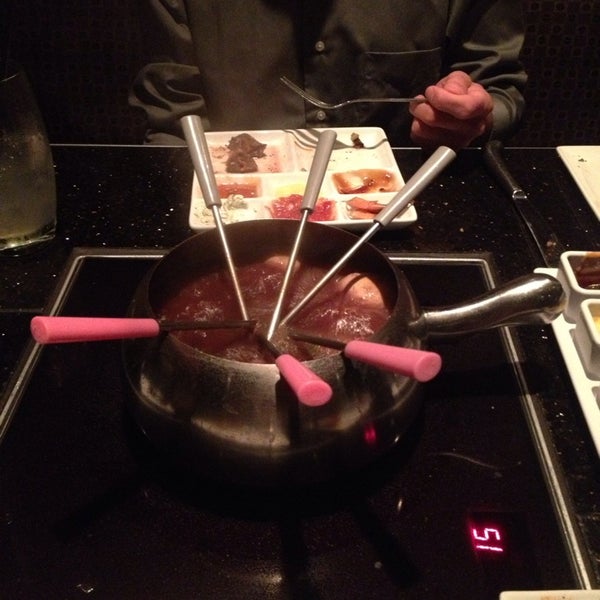 Photo taken at The Melting Pot by Karley S. on 6/19/2013