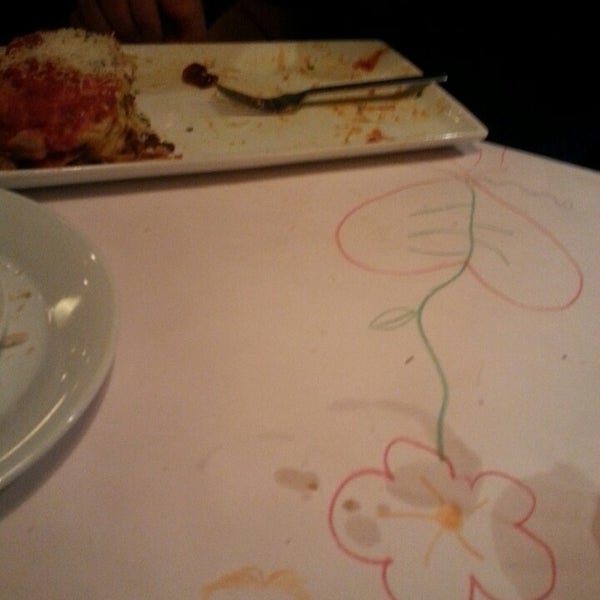 Photo taken at Romano&#39;s Macaroni Grill by El C. on 6/4/2014