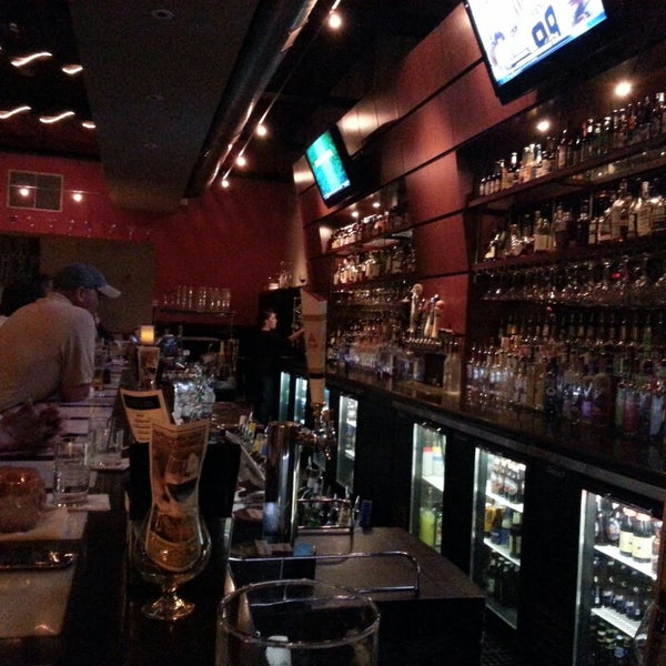 Photo taken at Downtown Main Martini Bar &amp; Grille by Guy A. on 6/20/2013