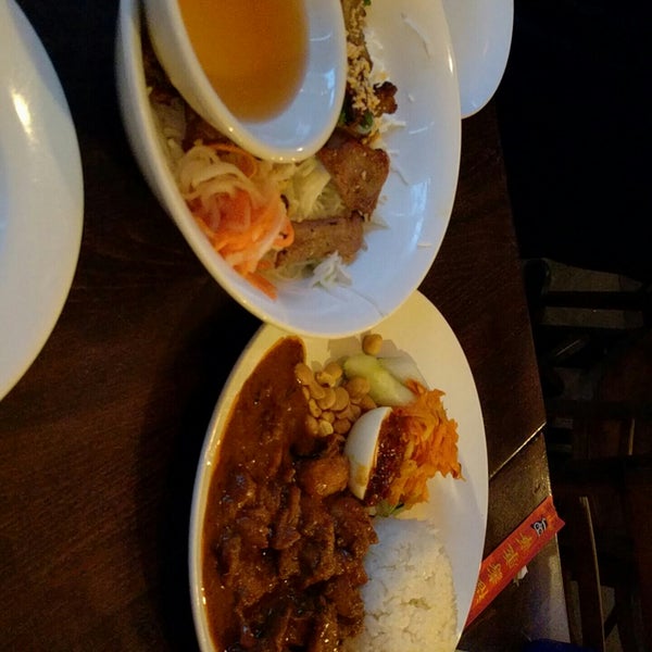 Chicken rendang nasi lemak with pork with vermicelli and Thai ice tea! Great place to try a little of everything from three countries!